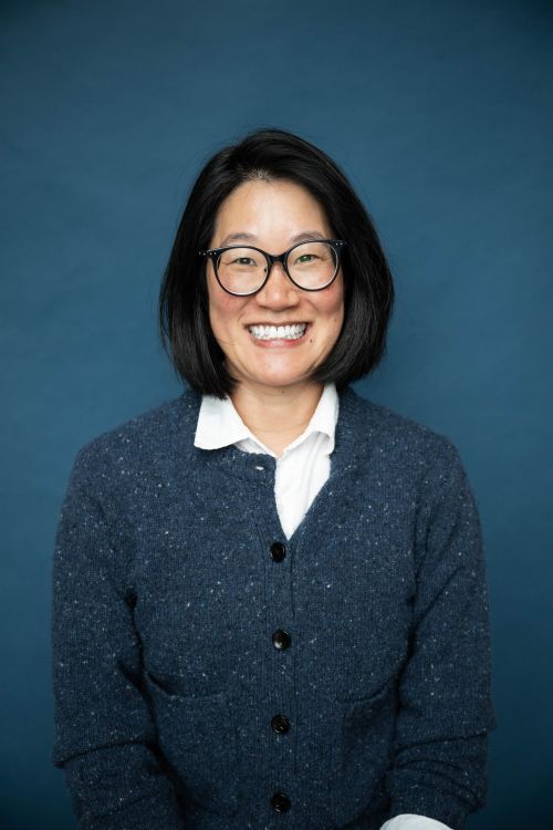 Hezie Rhee smiles